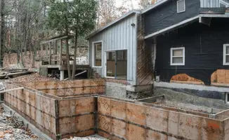 Prepared site with foundation forms for home remodeling and addition project in Boise, ID